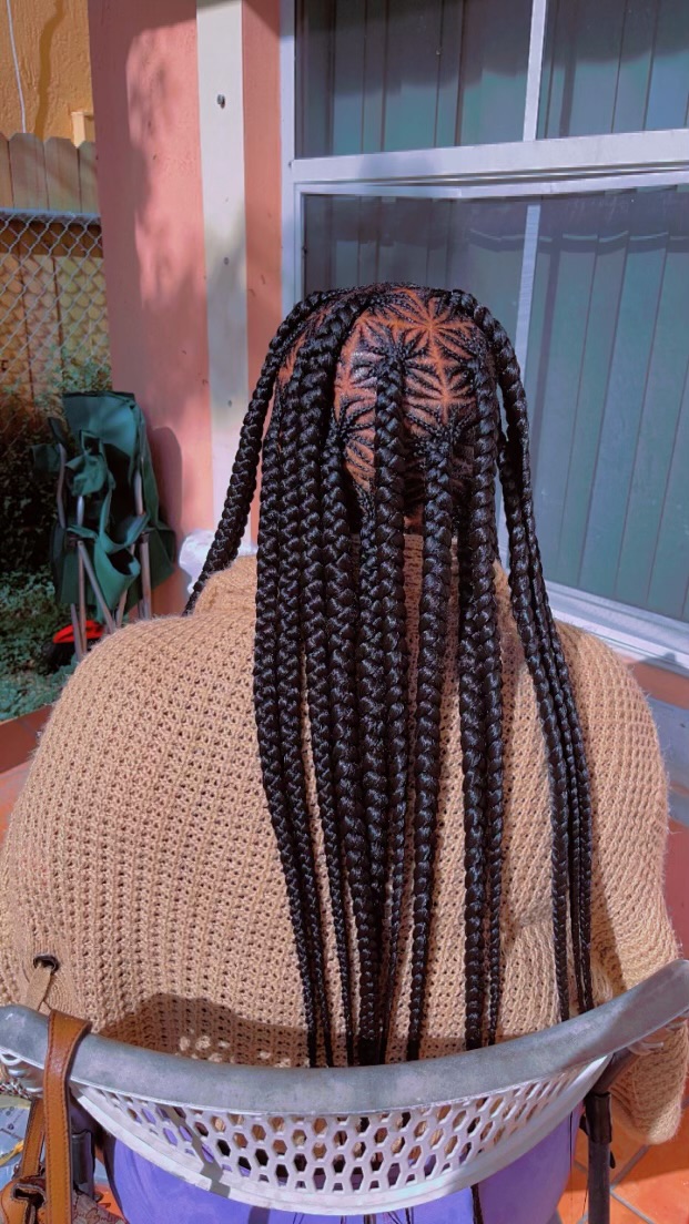 Neat medium box braids with a detailed crown pattern